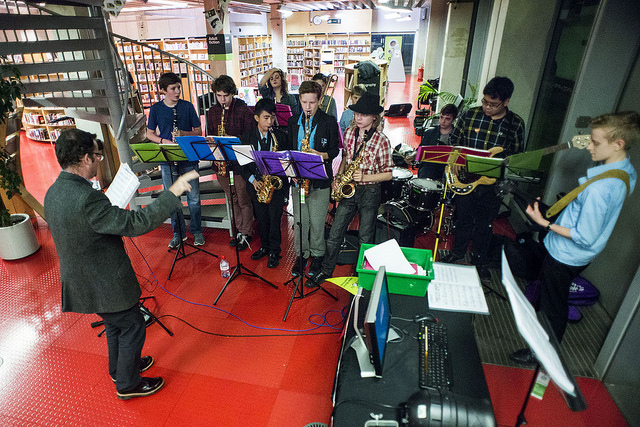 a school band performs inside the Idea Store Whitechapel for the 2015 Writeidea Festival