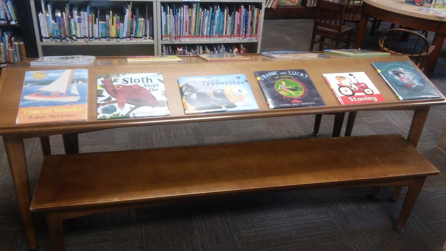 bench with new children's books